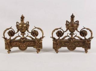 Appraisal: PAIR OF FRENCH GILT BRONZE CHENETS WITH SATYR MASK MOUNTS