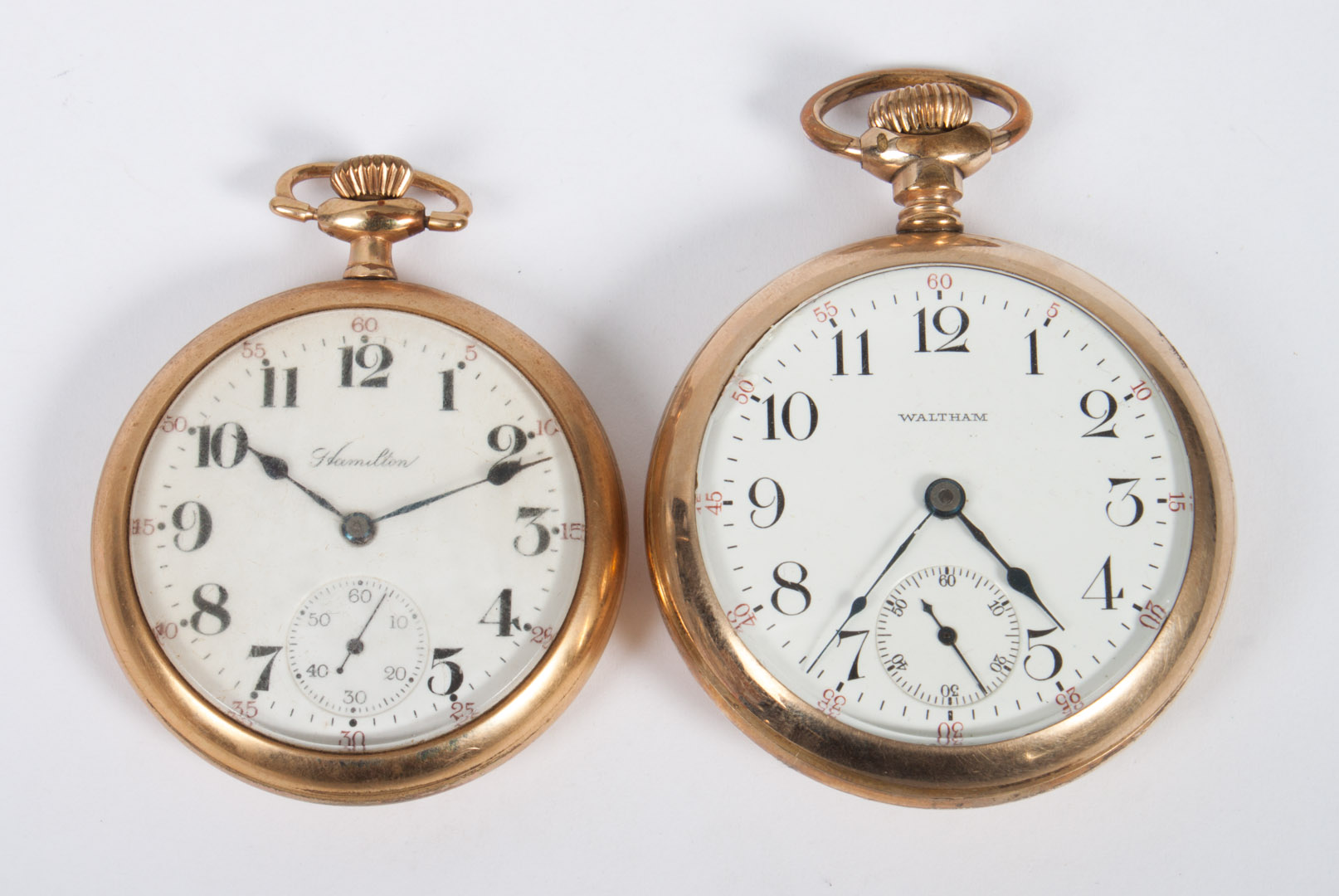 Appraisal: Two gold-filled open-face pocket watches American Waltham jewels movement in