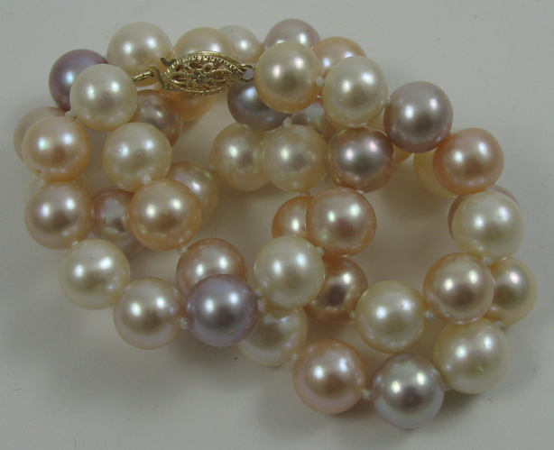 Appraisal: MULTI-COLOR PEARL CHOKER LENGTH NECKLACE Mixed pink white and violet