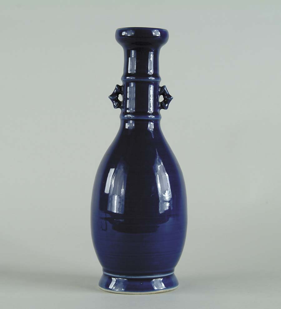 Appraisal: ORIENTAL BLUE GLAZE BOTTLE SHAPE VASE Heavy vase has deep