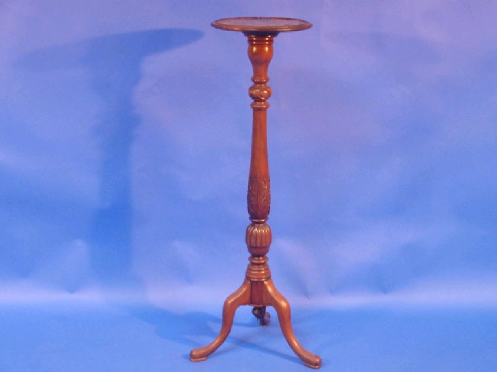 Appraisal: An early thC mahogany torchere stand with circular top acanthus