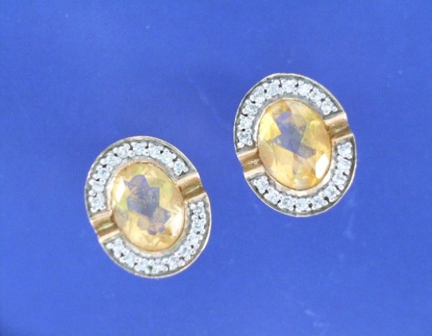 Appraisal: A pair of ct gold citrine and diamond cluster earrings