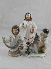 Appraisal: Three Soviet Russian Lomonosov ceramics being Yakut figures of a