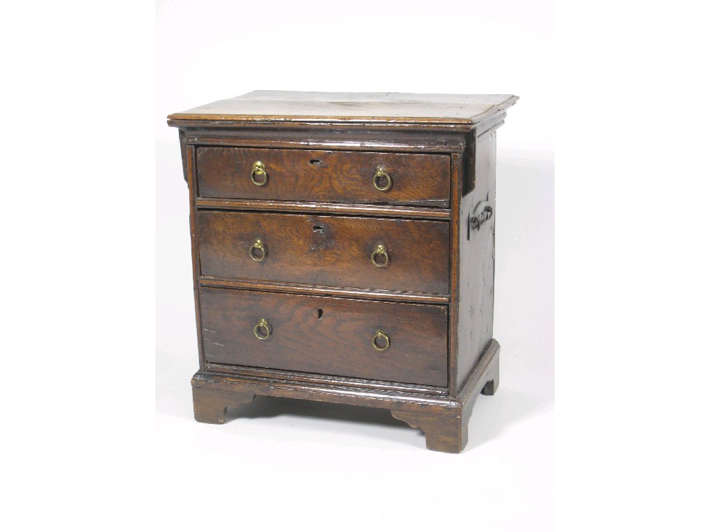 Appraisal: An th Century small oak Chest of three long drawers