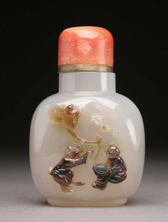 Appraisal: CAMEO AGATE SNUFF BOTTLE Finely hollowed cameo carved agate snuff