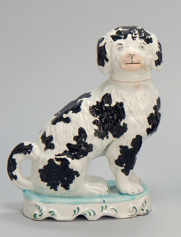 Appraisal: RARE STAFFORDSHIRE FIGURE English th CenturyOf a black and white