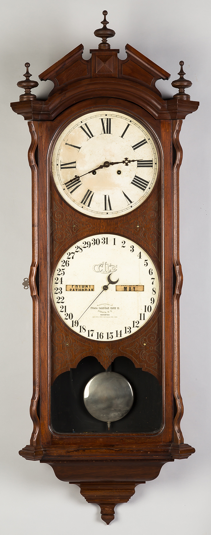 Appraisal: Ithaca Bank Wall Calendar Clock Carved walnut case old refinish