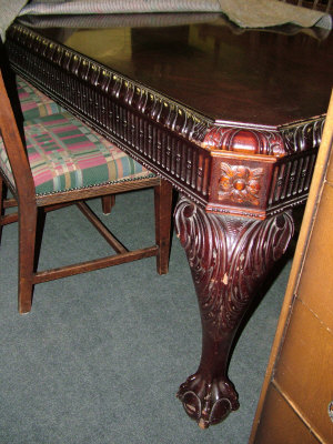 Appraisal: A mahogany dining table th century the gadrooned canted top