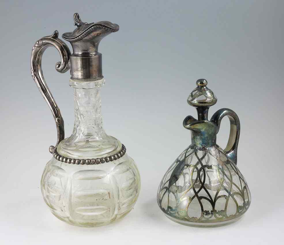 Appraisal: STERLING OVERLAY DECANTER AND SILVERPLATE MOUNTED CLARET JUG piece to