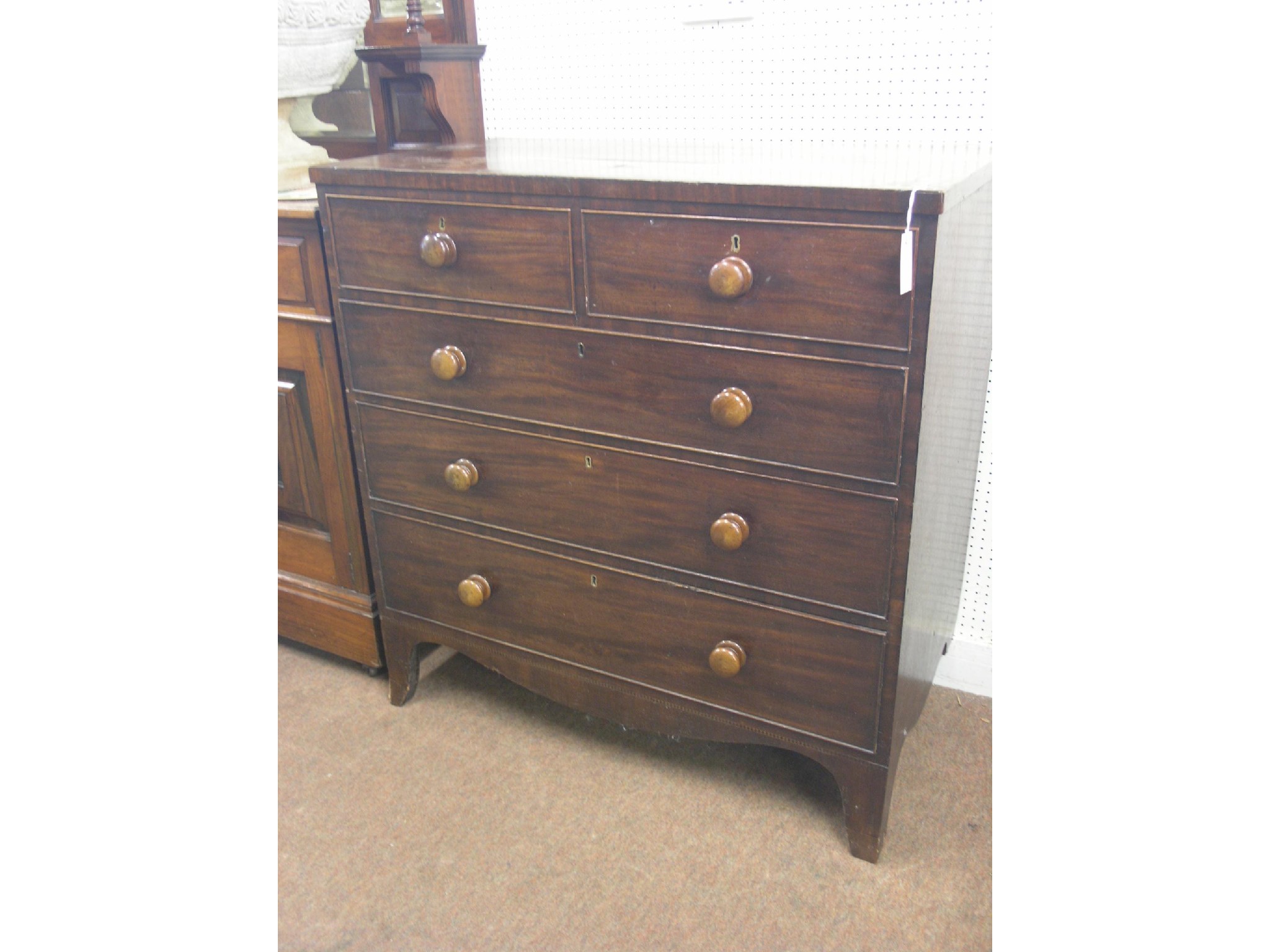 Appraisal: A Victorian mahogany chest two short and three long graduated