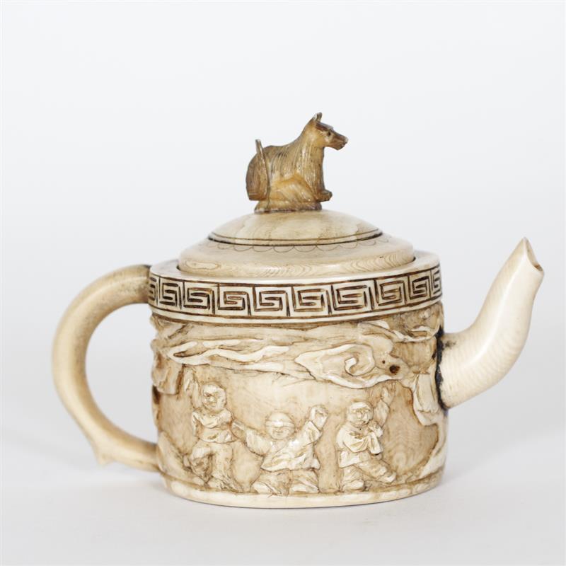 Appraisal: Chinese Miniature Ivory Teapot with carved relief imagery of children