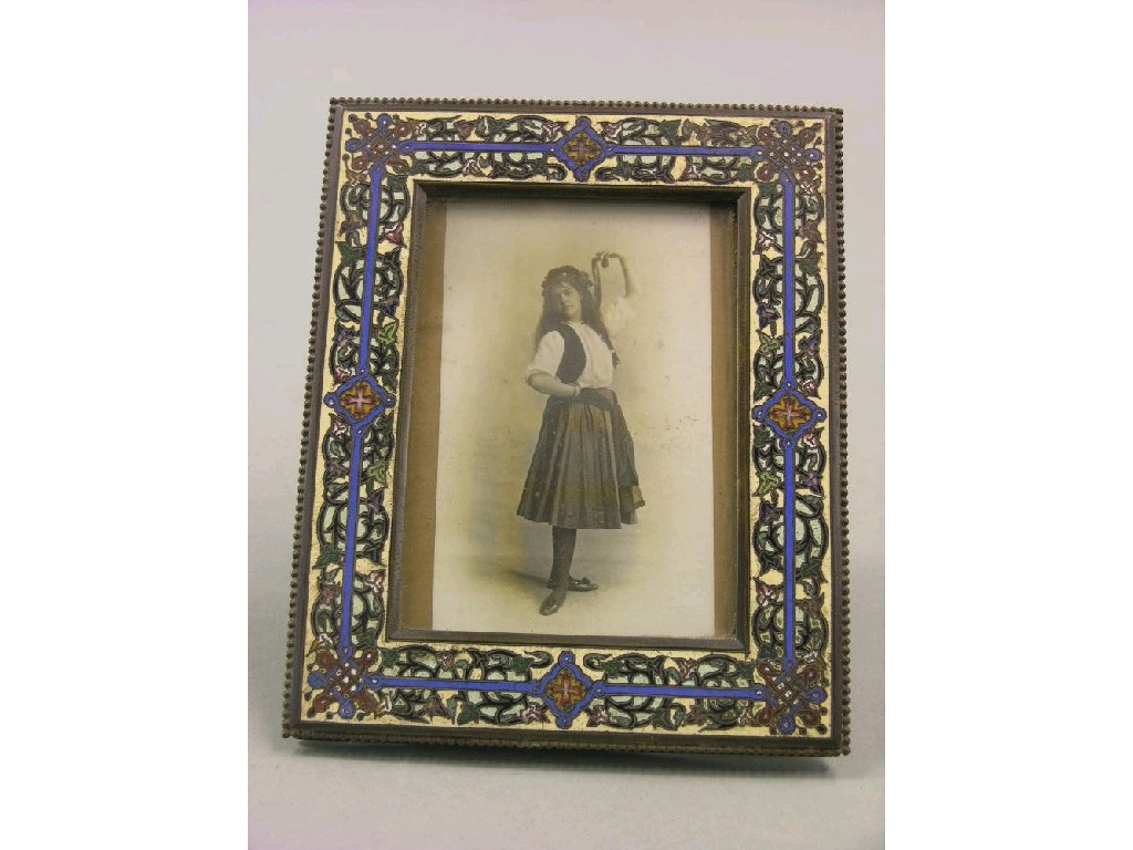 Appraisal: A th century enamelled French photograph frame champleve-effect design x