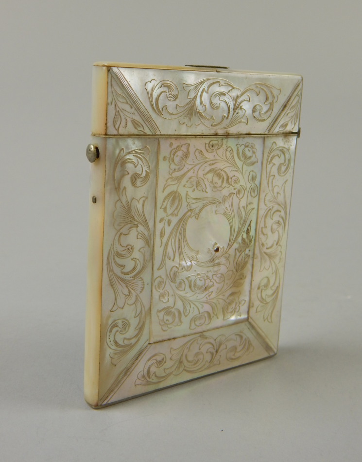 Appraisal: A Victorian mother of pearl card case engraved overall with