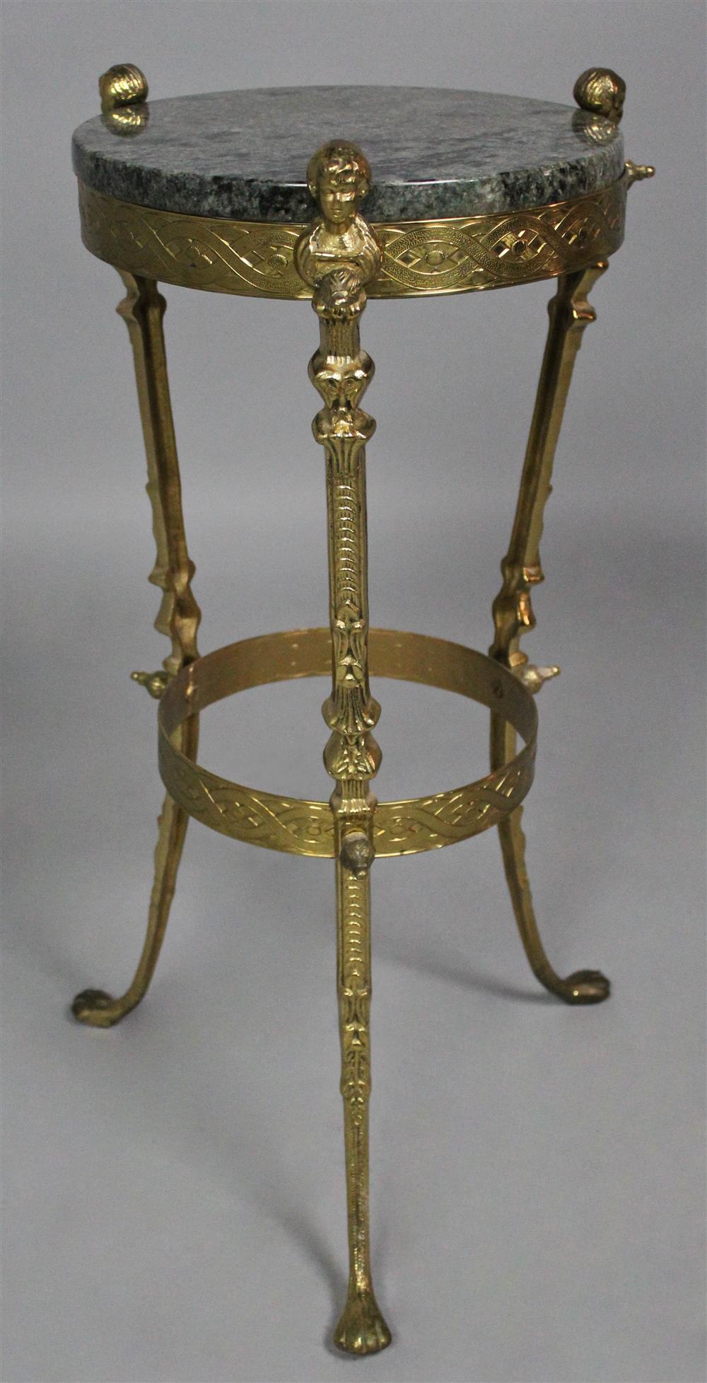 Appraisal: LATE VICTORIAN CAST BRASS TWO-TIER SIDE TABLE the tripod supports