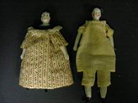 Appraisal: DOLL HOUSE CHINA HEADS Cloth body bisque arms and legs