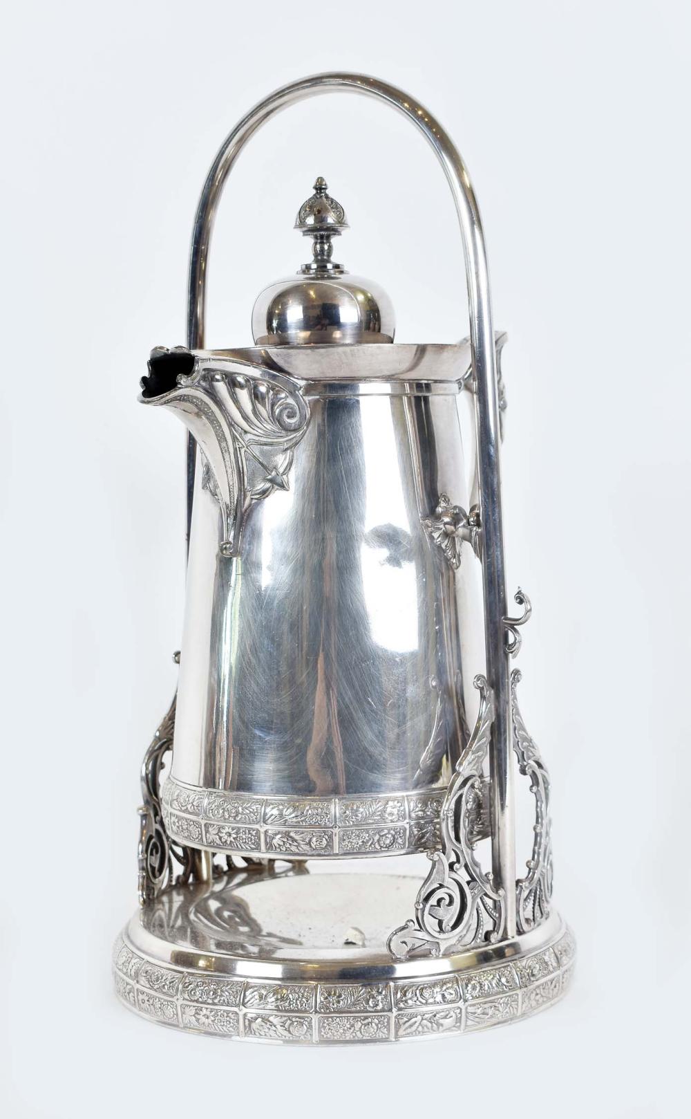 Appraisal: AESTHETIC MOVEMENT SILVER PLATE HOT WATER KETTLE ON STANDMeriden Circa