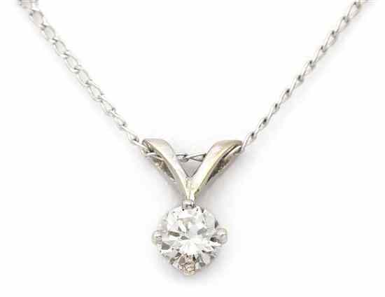 Appraisal: A Karat White Gold and Diamond Pendant containing one round