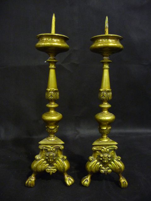 Appraisal: A pair of European brass pricket sticks the spikes centring