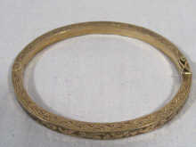 Appraisal: A carat gold finely engraved Victorian bangle weighing approx grams