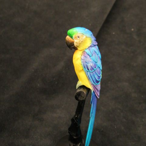 Appraisal: Carved Ivory Figurine of a Parrot fine coloring with wooden