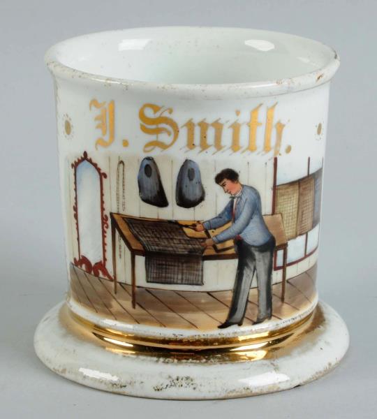 Appraisal: Tailor Shaving Mug Mug depicts a tailor cutting fabric Heavy