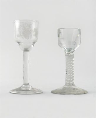 Appraisal: A toast master's wine glass with thickly moulded bowl raised