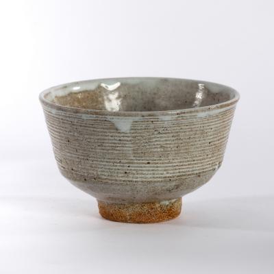 Appraisal: William 'Bill' Marshall British - a ribbed circular footed bowl