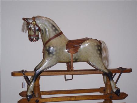 Appraisal: A small Victorian rocking horse the grey horse with harness