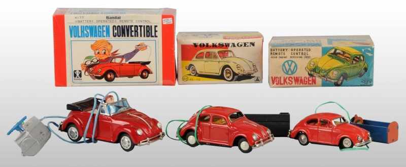 Appraisal: Lot of Tin Volkswagen Battery-Operated Toys Description Japanese Working Includes