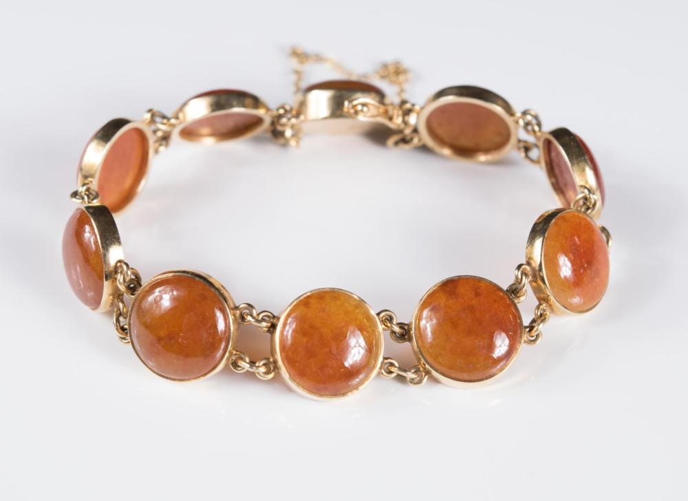 Appraisal: GUMPS CARNELIAN AND FOURTEEN KARAT GOLD BRACELET The vintage k