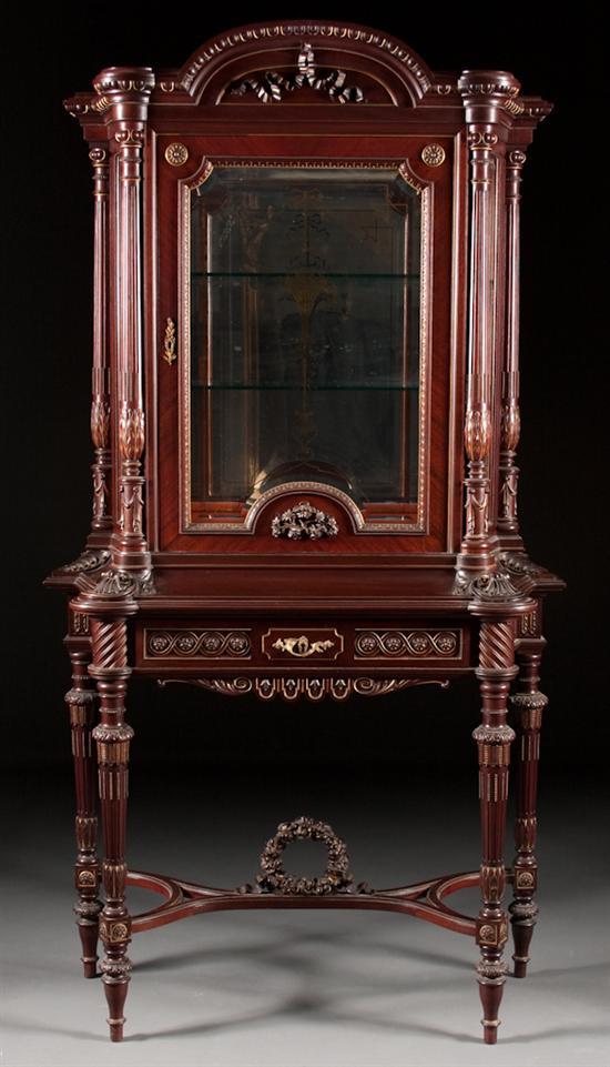 Appraisal: Napoleon III gilt-metal-mounted carved mahogany parcel-gilt glass panel vitrine fourth