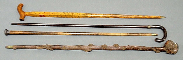 Appraisal: Four walking sticks and canes two with sterling silver handles