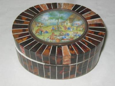 Appraisal: A CONTINENTAL TORTOISESHELL BOX of oval form radially veneered in