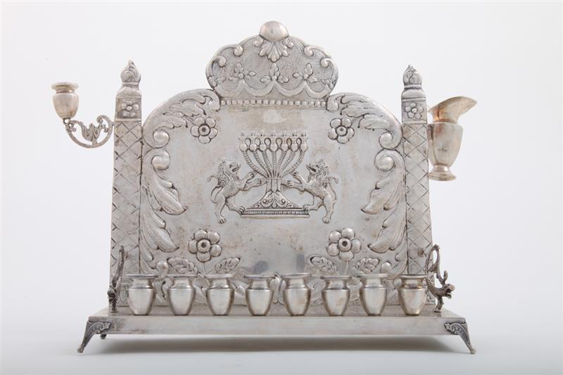 Appraisal: STERLING SILVER MENORAH Marked 'Sterling' the base fitted with eight