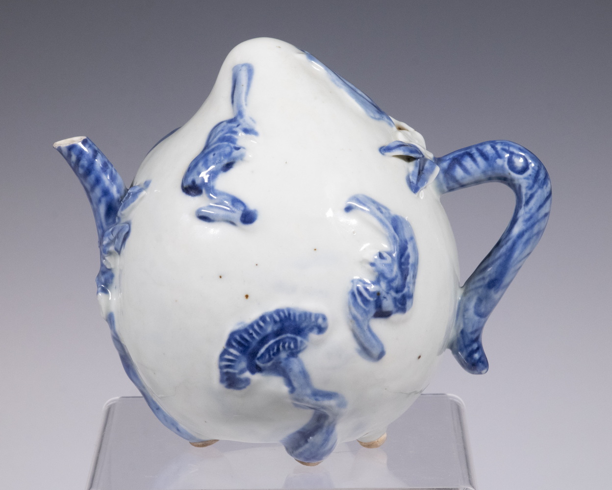 Appraisal: CHINESE CADOGAN TEAPOT th- th c Blue and White Peach