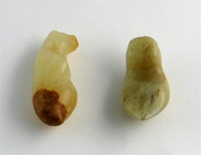 Appraisal: Two Chinese jade pendants one simplistically carved as cicada larva