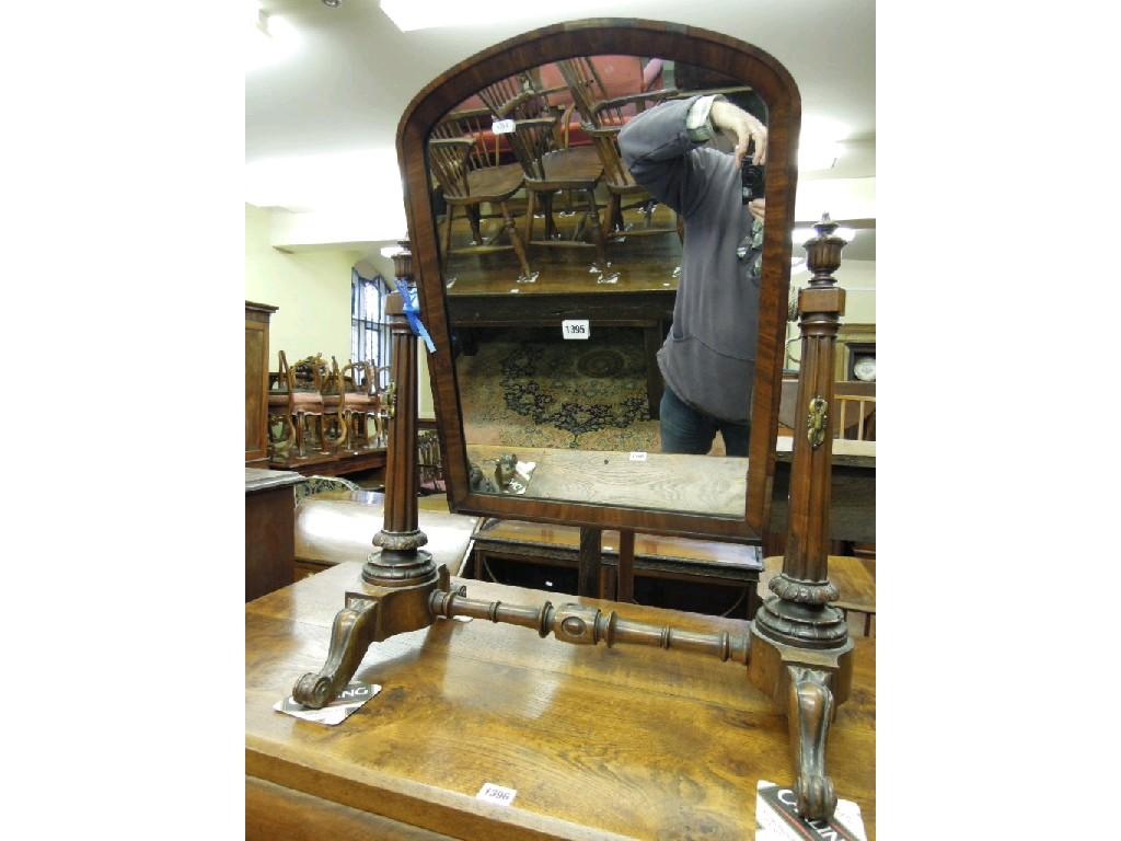 Appraisal: A Victorian mahogany toilet mirror of arched form raised on