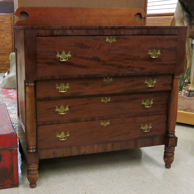 Appraisal: EMPIRE MAHOGANY CHEST OF DRAWERS American c - the front