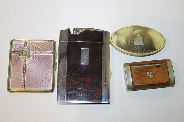 Appraisal: A SILVER CIGARETTE CASE with engine turned and pink enamelled