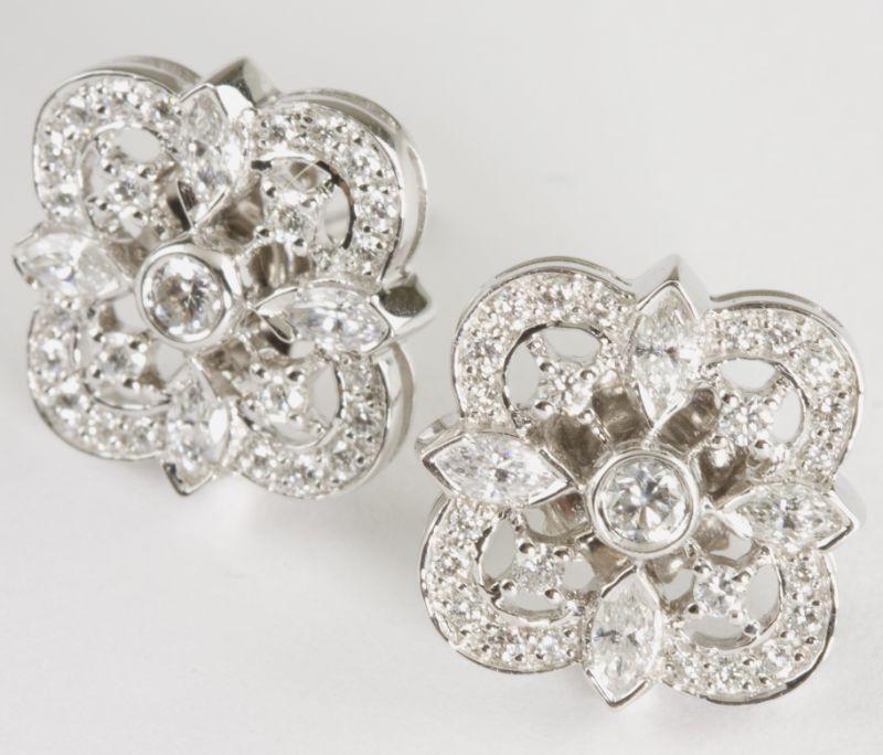 Appraisal: Kwiat KT White Gold and Diamond Earrings each centering upon