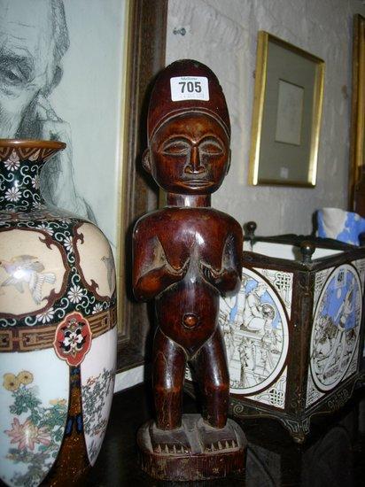 Appraisal: A TRIBAL CARVED WOOD FEMALE FIGURE high