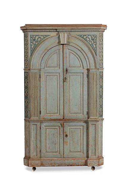 Appraisal: A GEORGE III LIGHT BLUE PAINTED PINE CORNER CUPBOARD with