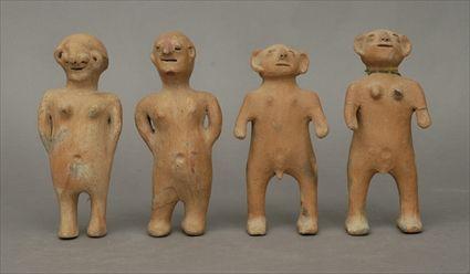 Appraisal: Four Pottery Figures in to in Provenance The Collection of