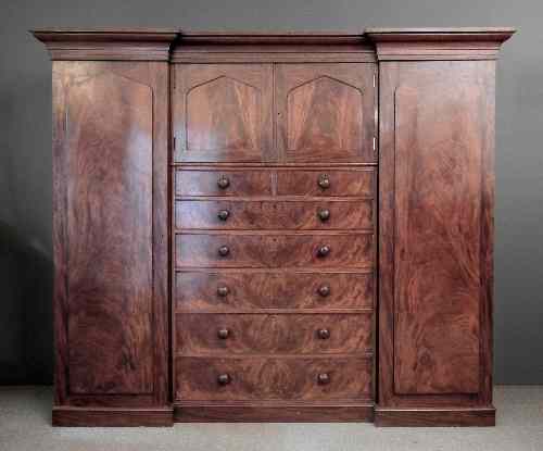 Appraisal: A William IV figured mahogany break-front wardrobe with moulded cornice