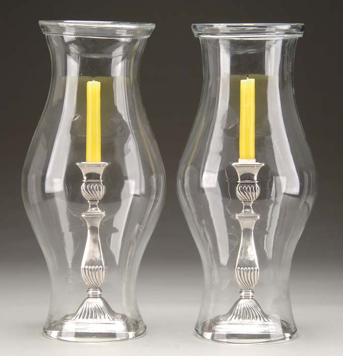 Appraisal: PAIR OF ANTIQUE SHEFFIELD CANDLESTICKS WITH HURRICANE SHADES Swirl shafts