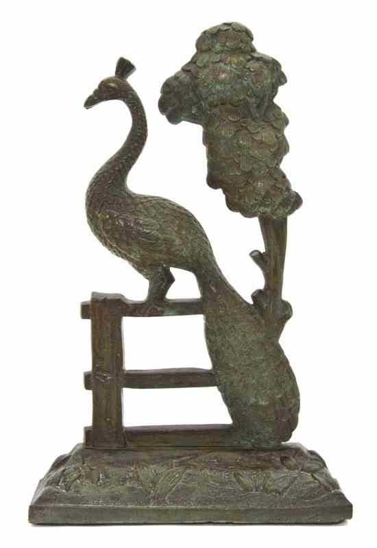 Appraisal: A Tiffany Studios Bronze Figural Doorstop depicting a peacock perched