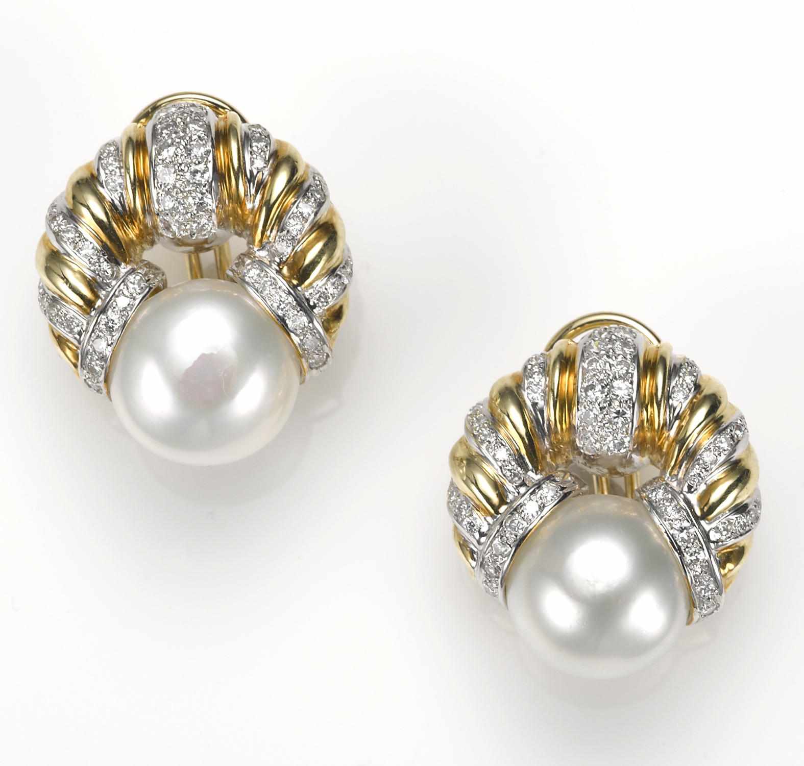 Appraisal: A pair of South Sea cultured pearl and diamond earrings