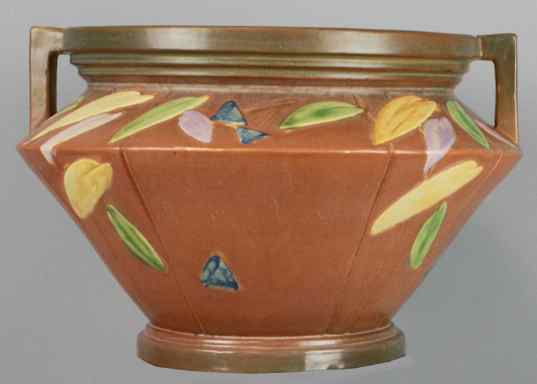 Appraisal: ROSEVILLE POTTERY FUTURA PATTERN URN decorated with pastel leaves and