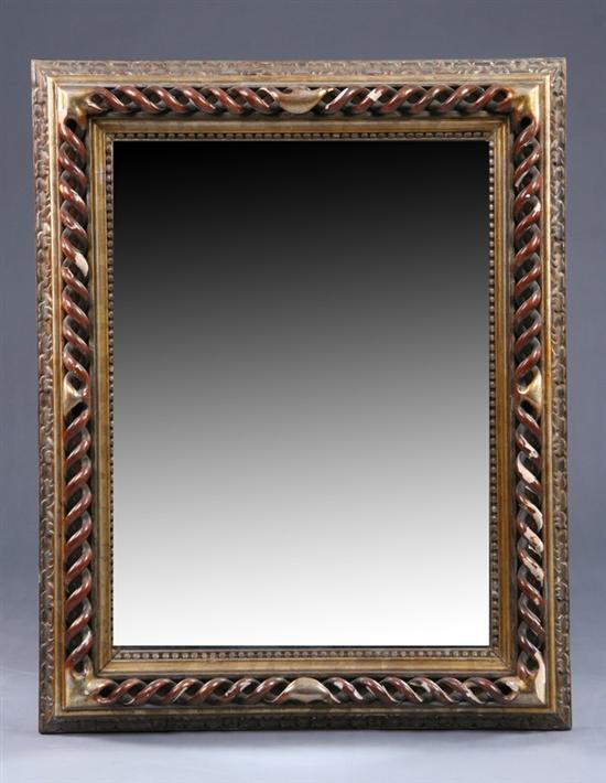 Appraisal: SPIRAL-TWISTED HANGING WALL MIRROR th century parcel-gilt and faux paint