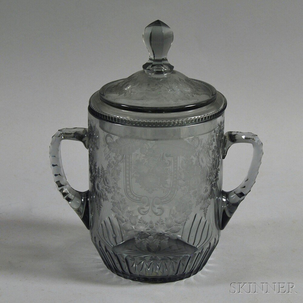 Appraisal: Wheel-etched Two-handled Covered Colorless Glass Jar with etched floral and